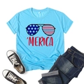 Hellblaues T-Shirt mit patriotischem Sonnenbrillen-Print und 'MERICA-Schriftzug - S / Unabhängigkeitstag Sonnenbrille Print / Hellblau