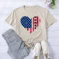 Women heart nurse print khaki short sleeve t-shirt flat lay with jeans and sneakers - S / Sand (Black Font)