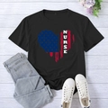Black short sleeve nurse t-shirt with heart US flag print on gray wood background - S / Black (White Font)