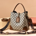 Classic checkered bucket bag with leather trim and wide vintage patterned strap - Khaki