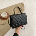 Classic black quilted leather crossbody bag with gold chain strap and top handle - Black