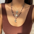 Detailed close-up of layered necklace set featuring purple stone beads and moon charms - Silver + Purple (4134)