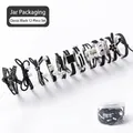 Classic black 12-piece hair tie set including pearl and bow styles in a clear storage jar - 12-Piece Black Jar Set