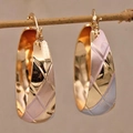 Polished golden wide hoop earrings with quilted diamond pattern and spring clasp - Gold Oval Quilted Hollow