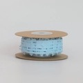 Roll of light blue lace ribbon with delicate laser-cut patterns for gift wrapping - With Core / Size 10 / Blue