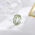 Detail of light green chain-link open ring with glossy finish on textured white background - Adjustable Open / Light Green