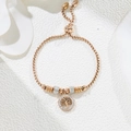 Rose gold Tree of Life bracelet with pavé crystal charms and adjustable slider clasp - Rose Gold