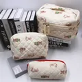 Quilted cotton bear print cosmetic bag set with top handle and zip closure in cream - New Quilted Bear