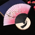 Pink gradient Chinese folding fan with cherry blossoms, butterflies and black tassels - Pink Sakura Black Rib