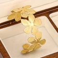 Exaggerated golden flower statement bangle with detailed textured floral petals - Large Flower Cluster Radial Grain (bk029-KC)