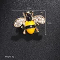 Detailed close-up of a 2.1x1.4cm crystal bee brooch with yellow enamel and 3g weight - Yellow Bee (XD8870-2)