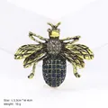 Blue rhinestone bee brooch in gold alloy finish, dimensions 3.3cm by 4cm for clothing decor - Antique Gold Dark Blue (XD824005-1)