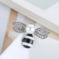 Cute bee brooch pin with silver finish, white pearl accent, and crystal wings - Black And White Silver Wings Bee (BR2403-2)