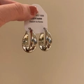 Handheld 925 sterling silver hoop earrings with a twisted double-layered geometric design - Twisted Ribbon Hoop Earrings - A2791 Silver