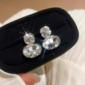 Silver 925 stud earrings featuring stacked oval and square cubic zirconia stones - E6973 Silver