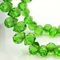 Polished multifaceted green crystal waterdrop glass beads for elegant jewelry making - Grass Green / 6mm (approximately 87 Beads Per Strip)