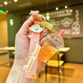 Detail of cute orange bubble tea keychain with sequins, bell and Sweet Heart strap - Orange Luminous Bubble Bead Frappe Cup
