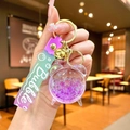 Portachiavi sveglia con perle luminose, campanellino dorato e ciondolo a forma di orso viola - Imballaggio in Sacchetto OPP Indipendente / Viola