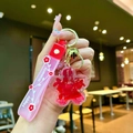 Portachiavi floreale creativo con fiori secchi e cinturino in silicone rosa - Imballaggio in Sacchetto OPP Indipendente / Rosso