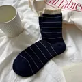 Dark blue striped cotton crew socks with white frilly ruffled cuffs in a vintage style - Navy Blue