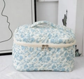 Cute quilted cotton cosmetic bag with light blue floral pattern and top handle - Sanitary Napkin Bag / White Base Blue Orchid