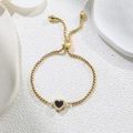 Detail of adjustable gold-plated chain bracelet with a black heart and sparkling crystals - Black Heart (Gold Color) (D180)