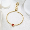 Close-up of golden bolo bracelet with red enamel heart and zircon stones on ceramic base - Red Heart (Gold Color) (D180)