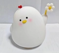 Cute white chicken silicone night light with red heart comb holding a small flower - Silicone Flower Chicken (Rechargeable-7 Colors)