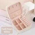 Detail of pearlescent white jewelry box with ring slots and textured leather surface - 9.5*9.5*5 / Twill Pearlescent White
