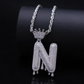 Hiphop silver letter N pendant with crown and drip design encrusted in zircons - Letter N / Silver