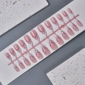 Almond-shaped press-on nails with 3D flower, red bow, and rhinestone accents in nude pink - Wy-108 / 10 Pieces In Xs Size