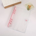 A6 size transparent PVC binder cover with pink six-ring metal clips and snap closure - A6 / Coral Pink