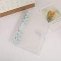 Transparent A5 A6 PVC binder cover with light blue 6-ring clips and snap closure - A6 / Baby Blue