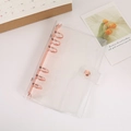 Transparent 6-hole PVC binder cover with rose gold metal rings and snap closure - A6 / Rose Gold