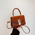 Retro caramel brown crocodile-embossed square handbag with a gold H-buckle closure - Brown
