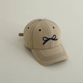 Beige cotton baseball cap for kids with a dark blue embroidered bow and adjustable strap - Khaki