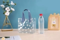 Transparent PVC daisy gift tote bag with light blue leather handles for summer - Blue Print