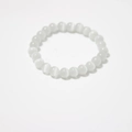 Close-up of white translucent cat eye beads bracelet showing cat-eye light effect - White Cat's Eye Bracelet 8mm