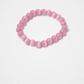 Close-up of pink cat eye stone beaded bracelet with 8mm round beads on white background - Pink Cat's Eye Bracelet 8mm