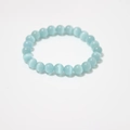 Close-up of light blue cat eye stone beaded bracelet with 8mm round natural crystal beads - Sky Blue Cat's Eye Bracelet 8mm