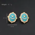 Vintage palace style earrings with blue enamel heart and pearls on a black background - Peach & Blue with Center Gold Heart & Pearl Style (Silver Post-499)