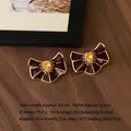 Retro bow earrings in brown enamel with yellow zircon stones and 925 silver pins - Dark Brown Bow Yellow Zircon Vintage Style (Silver Post-497)