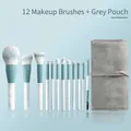 Blue and white 12-piece makeup brush set with marble handles and gray storage roll - 12Pcs Brush Set With Grey Pouch
