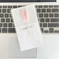 Detail view of a white gift card with pink dried flowers and Especially for you seal - Pink Color Rabbit Tail Grass Style