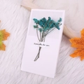 Detail of handmade greeting card with blue dried flowers and Especially for you text - Lake Blue Crystal Grass Style