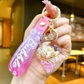 Gros plan d'un porte-clés coquillage rose avec paillettes et sangle de bulle - Corde Dégradée [rose] Petit Coquillage + Coquillage