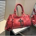 Red motorcycle style crossbody bag with pleated texture and silver cross charm detail - Red