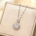 Sunflower zircon pendant necklace in silver stainless steel on beige jewelry box - Silver
