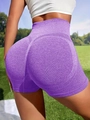 High-waisted seamless scrunch butt yoga shorts in vibrant purple for fitness - Purple