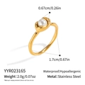 Detailed macro view showing the 1.7cm inner diameter and 0.67cm pearl of the gold ring - Flower Bud Single Pearl Style (YYR023165)